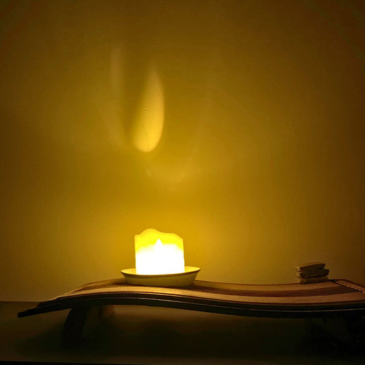 Chronometer of Light illuminated on a wooden desk, warm glow highlighting the beam and bowl